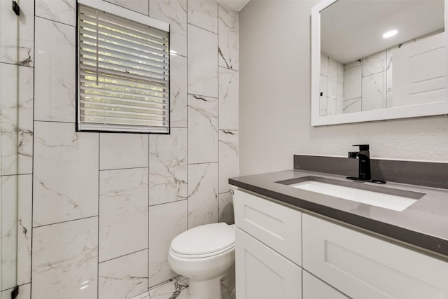full bath with toilet and vanity