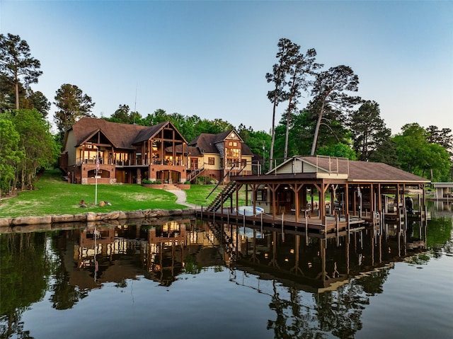 SQ13 Lake Cherokee, Henderson, TX 75652 - view of dock with a deck with water view, stairs, boat lift, and a lawn