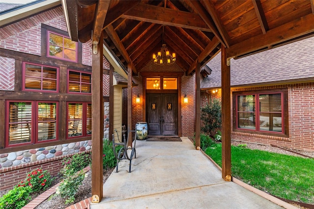 SQ13 Lake Cherokee, Henderson, TX 75652 - view of exterior entry with brick siding and a shingled roof