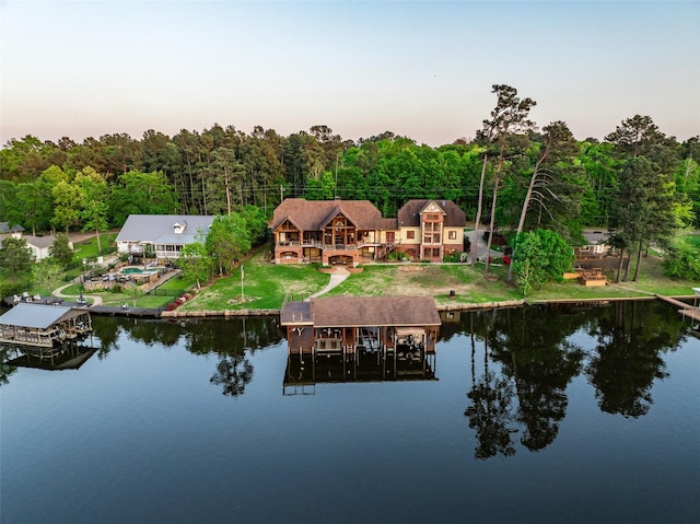 SQ13 Lake Cherokee, Henderson, TX 75652 - exterior space featuring boat lift, a water view, and a view of trees