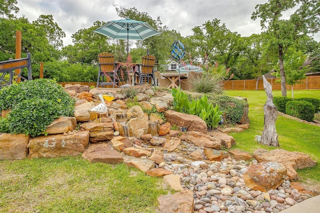 view of yard featuring fence