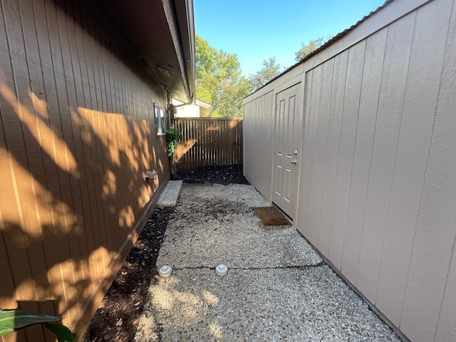 9434 Chimney Corner Ln, Dallas, TX 75243 - view of side of property with a shed, fence, and an outdoor structure