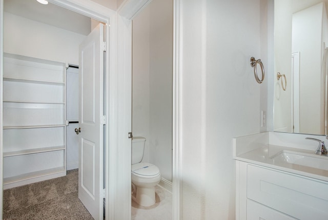 627 Rain Barrel Pl, Weston, TX 75009 - bathroom with toilet, baseboards, and vanity