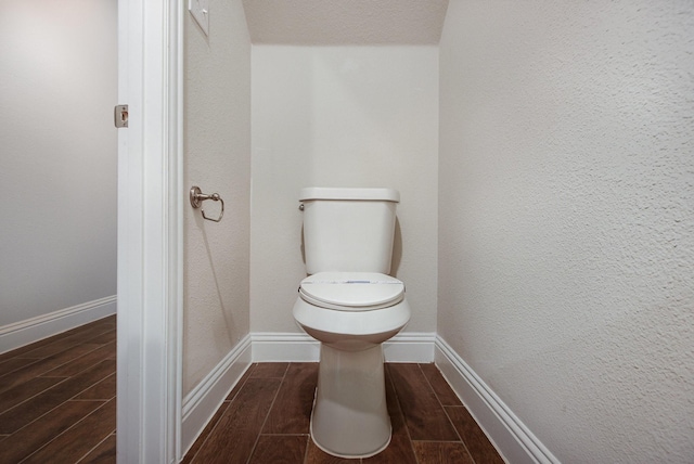 627 Rain Barrel Pl, Weston, TX 75009 - bathroom featuring toilet, wood tiled floor, and baseboards