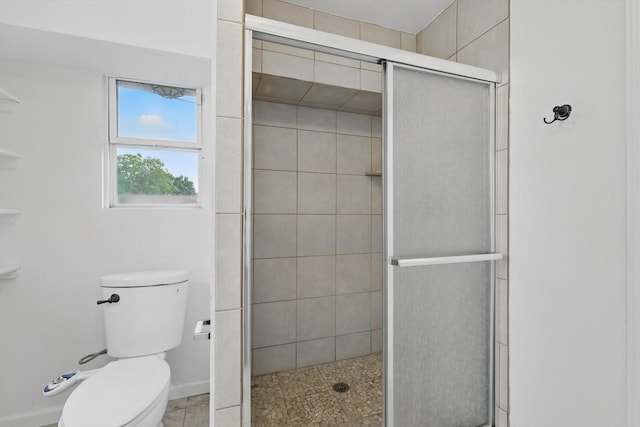 full bath with a stall shower and toilet