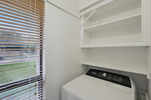 washroom with washer / dryer and laundry area