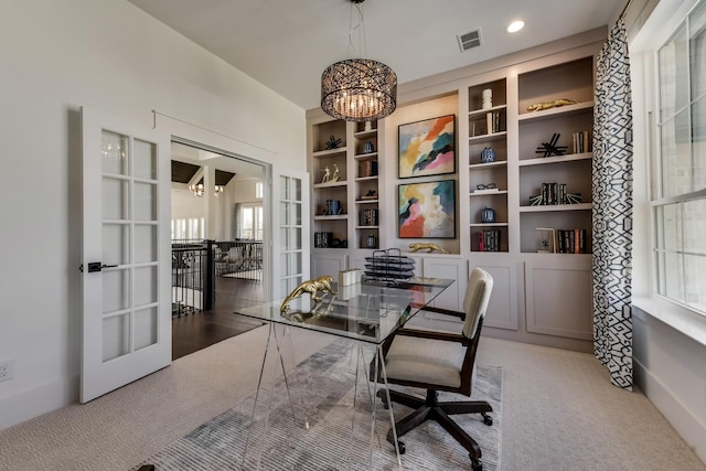 1725 Ranch House Rd, Celina, TX 75009 - home office featuring a chandelier, carpet flooring, french doors, and built in shelves