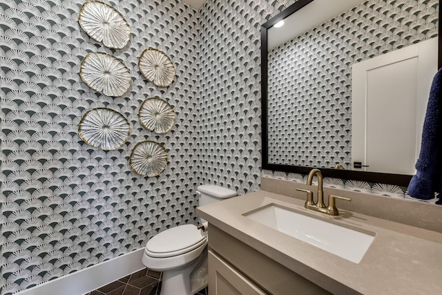 1725 Ranch House Rd, Celina, TX 75009 - bathroom with toilet, vanity, wallpapered walls, and tile patterned floors