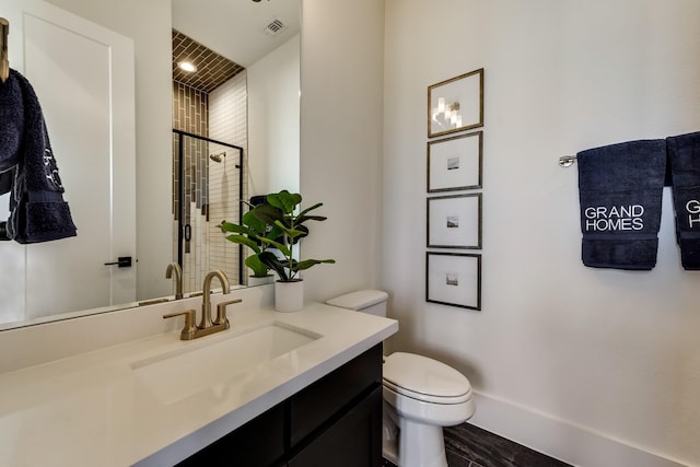 1725 Ranch House Rd, Celina, TX 75009 - bathroom with toilet, vanity, a shower stall, and baseboards