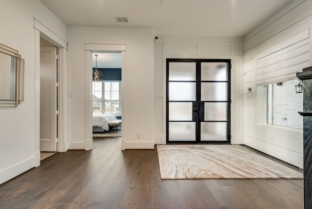 1725 Ranch House Rd, Celina, TX 75009 - foyer featuring french doors, dark wood finished floors, ceiling fan, and baseboards