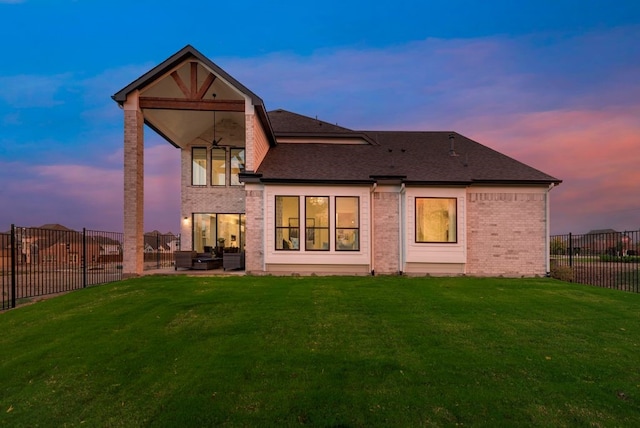 1725 Ranch House Rd, Celina, TX 75009 - back of house with brick siding, an outdoor living space, a shingled roof, and a patio area