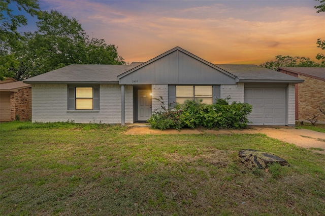 2405 Sweetwood Dr, Fort Worth, TX 76131 - ranch-style home with an attached garage, brick siding, driveway, and a yard