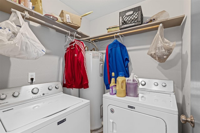 2405 Sweetwood Dr, Fort Worth, TX 76131 - laundry area featuring washing machine and clothes dryer, laundry area, and electric water heater