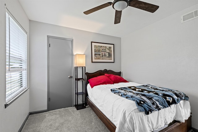 2405 Sweetwood Dr, Fort Worth, TX 76131 - carpeted bedroom with ceiling fan, baseboards, and visible vents