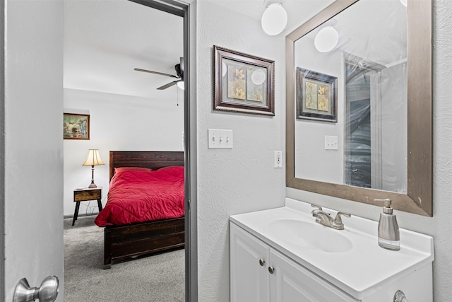 2405 Sweetwood Dr, Fort Worth, TX 76131 - ensuite bathroom featuring ensuite bath, vanity, ceiling fan, and a textured wall