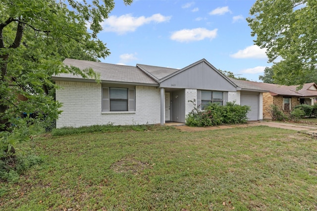 2405 Sweetwood Dr, Fort Worth, TX 76131 - ranch-style house with a front yard, brick siding, an attached garage, and driveway