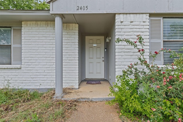 2405 Sweetwood Dr, Fort Worth, TX 76131 - view of exterior entry with brick siding