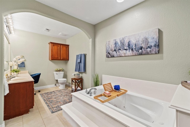 2512 Halloran St, Fort Worth, TX 76107 - bathroom with toilet, a whirlpool tub, tile patterned floors, visible vents, and vanity
