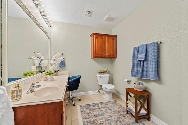 2512 Halloran St, Fort Worth, TX 76107 - bathroom with toilet, tile patterned floors, visible vents, baseboards, and vanity
