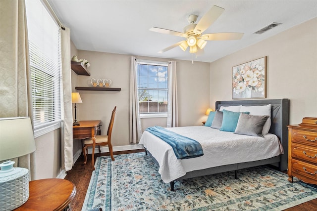 2512 Halloran St, Fort Worth, TX 76107 - bedroom featuring baseboards, ceiling fan, visible vents, and wood finished floors