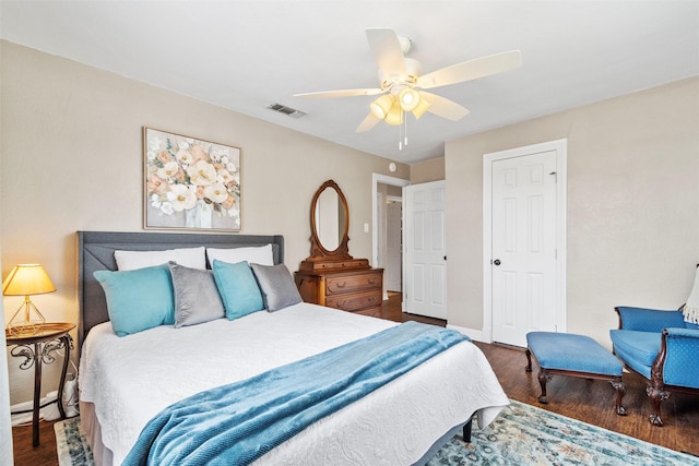 2512 Halloran St, Fort Worth, TX 76107 - bedroom with a closet, wood finished floors, visible vents, a ceiling fan, and baseboards