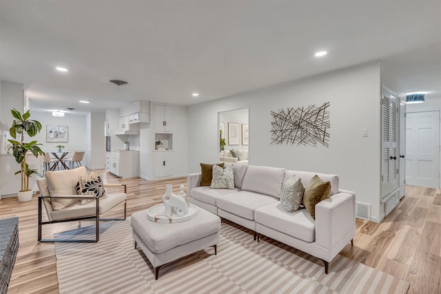5229 Cockrell Ave, Fort Worth, TX 76133 - living room with light wood-style flooring and recessed lighting