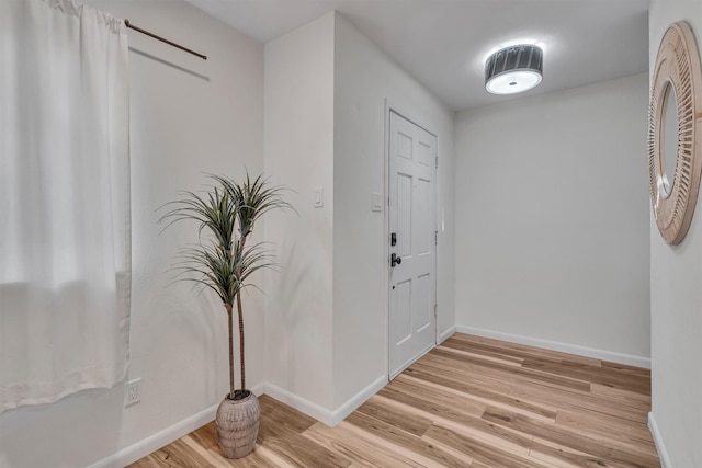 5229 Cockrell Ave, Fort Worth, TX 76133 - foyer entrance with light wood-style flooring and baseboards