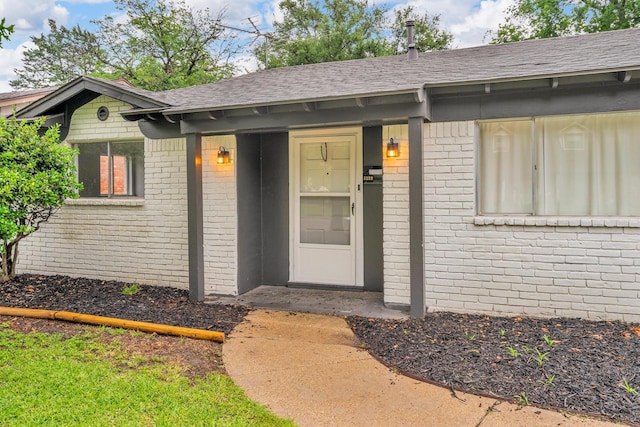 5229 Cockrell Ave, Fort Worth, TX 76133 - property entrance featuring brick siding and a shingled roof