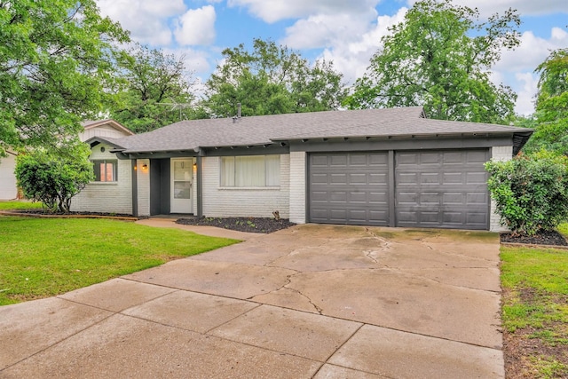 5229 Cockrell Ave, Fort Worth, TX 76133 - view of front facade with brick siding, a front lawn, and roof with shingles