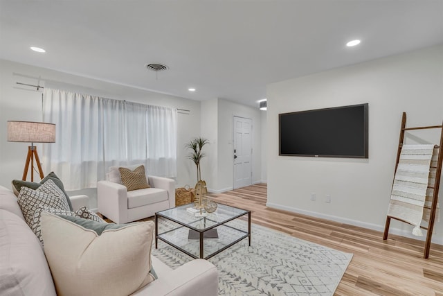5229 Cockrell Ave, Fort Worth, TX 76133 - living room with light wood finished floors, baseboards, and recessed lighting