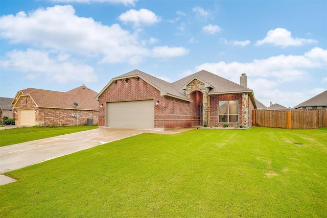 ranch-style house with a chimney, brick siding, fence, a garage, and a front yard