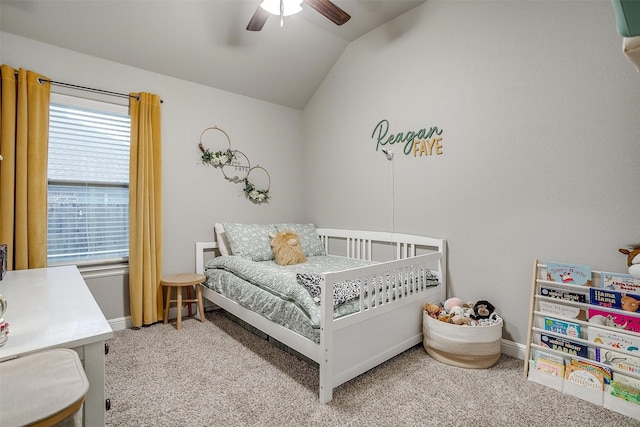 carpeted bedroom with baseboards, lofted ceiling, and ceiling fan