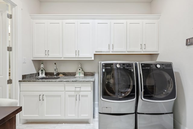 846 Cordoba Ln, Rockwall, TX 75087 - clothes washing area with washer and clothes dryer and cabinet space