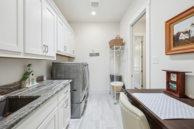 846 Cordoba Ln, Rockwall, TX 75087 - laundry area with washing machine and dryer, cabinet space, recessed lighting, baseboards, and light marble finish floors