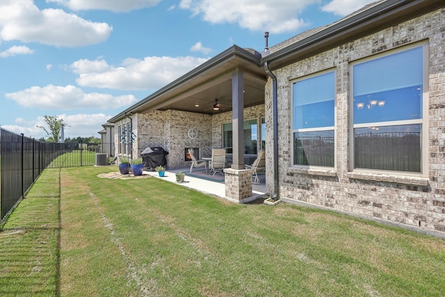 846 Cordoba Ln, Rockwall, TX 75087 - view of yard with ceiling fan, a patio area, and central air condition unit