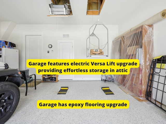 846 Cordoba Ln, Rockwall, TX 75087 - garage featuring white refrigerator with ice dispenser
