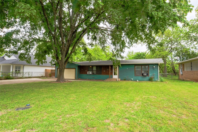 1915 W Bond St, Denison, TX 75020 - ranch-style home featuring an attached garage, fence, concrete driveway, a front lawn, and entry steps