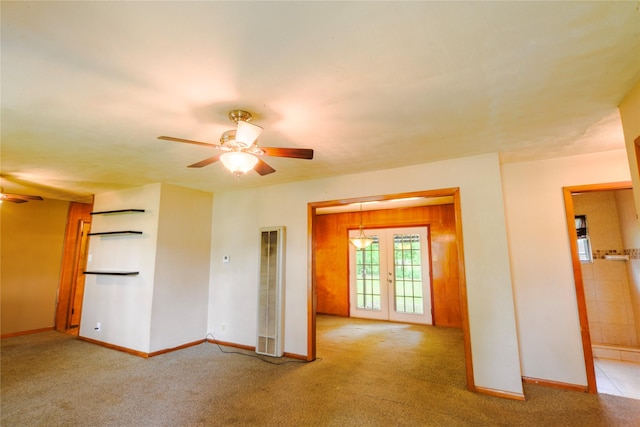 1915 W Bond St, Denison, TX 75020 - spare room featuring ceiling fan, baseboards, a heating unit, and carpet floors