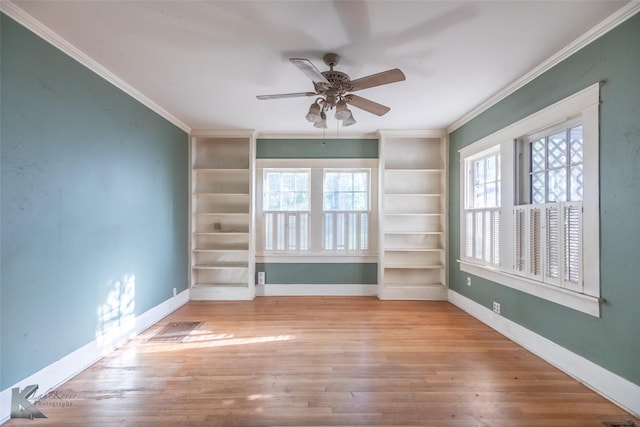 2234 Idlewild St, Abilene, TX 79605 - empty room featuring crown molding, healthy amount of natural light, a ceiling fan, baseboards, and wood finished floors