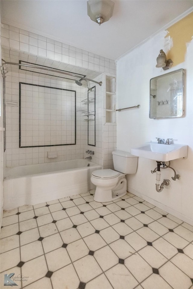 2234 Idlewild St, Abilene, TX 79605 - bathroom featuring toilet, shower / bathtub combination, and a sink