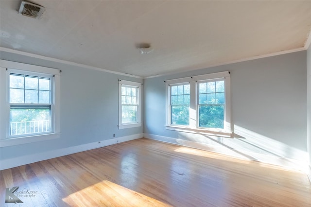 2234 Idlewild St, Abilene, TX 79605 - unfurnished room with crown molding, wood finished floors, and baseboards