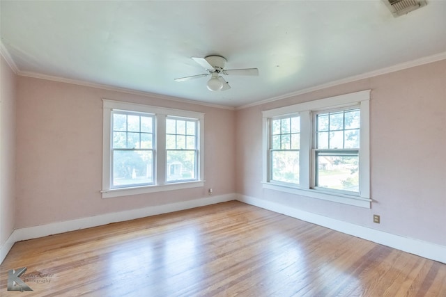 2234 Idlewild St, Abilene, TX 79605 - empty room featuring baseboards, wood finished floors, ceiling fan, and ornamental molding