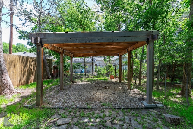 2234 Idlewild St, Abilene, TX 79605 - view of patio / terrace featuring fence, a carport, and a pergola