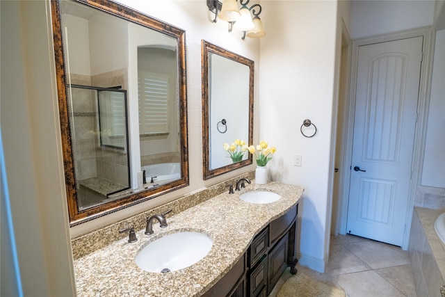 5117 Wakefield Dr, Irving, TX 75038 - bathroom featuring tiled bath, a tile shower, double vanity, and a sink