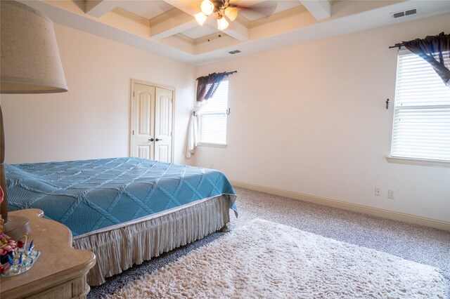 5117 Wakefield Dr, Irving, TX 75038 - carpeted bedroom with coffered ceiling, beamed ceiling, baseboards, and visible vents