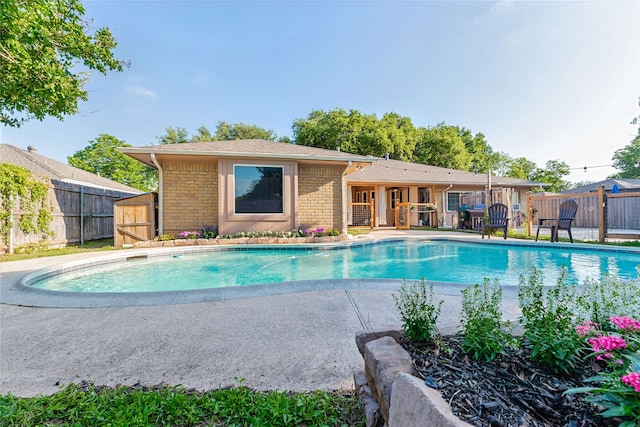 1307 S Westador Dr, Arlington, TX 76015 - view of pool with a fenced backyard and a patio