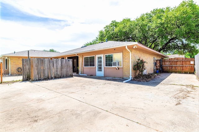 1307 S Westador Dr, Arlington, TX 76015 - view of front of property featuring brick siding and a patio area