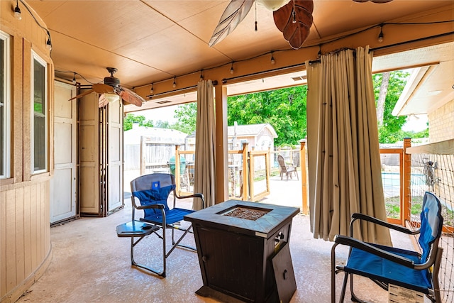 1307 S Westador Dr, Arlington, TX 76015 - view of patio / terrace featuring ceiling fan and an outdoor fire pit