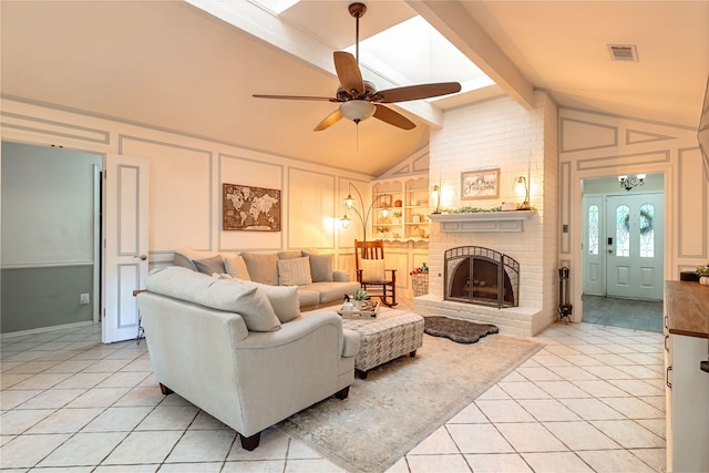 1307 S Westador Dr, Arlington, TX 76015 - living room with a decorative wall, light tile patterned flooring, a brick fireplace, and ceiling fan