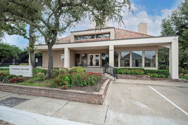 4242 N Capistrano Dr Unit 203, Dallas, TX 75287 - view of property with uncovered parking